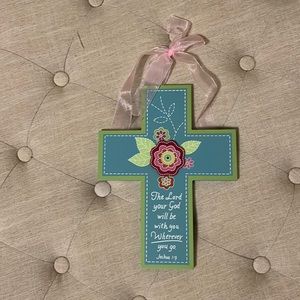 Blue wooden cross with ribbon